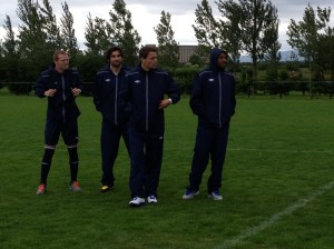 The guys from the EPL explaining the rules of the crossbar challenge they set up for the kids we were coaching 